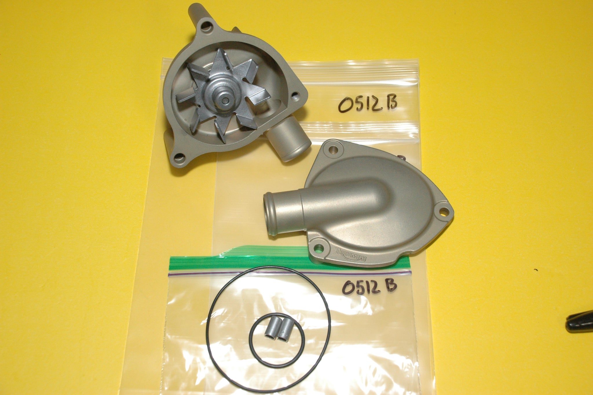 Triumph T2100680 Overhauled Water Pump Models Listed Below